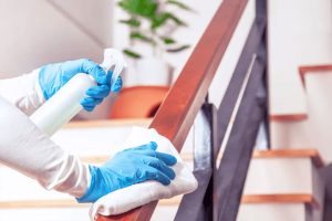 cleaning a stair rail